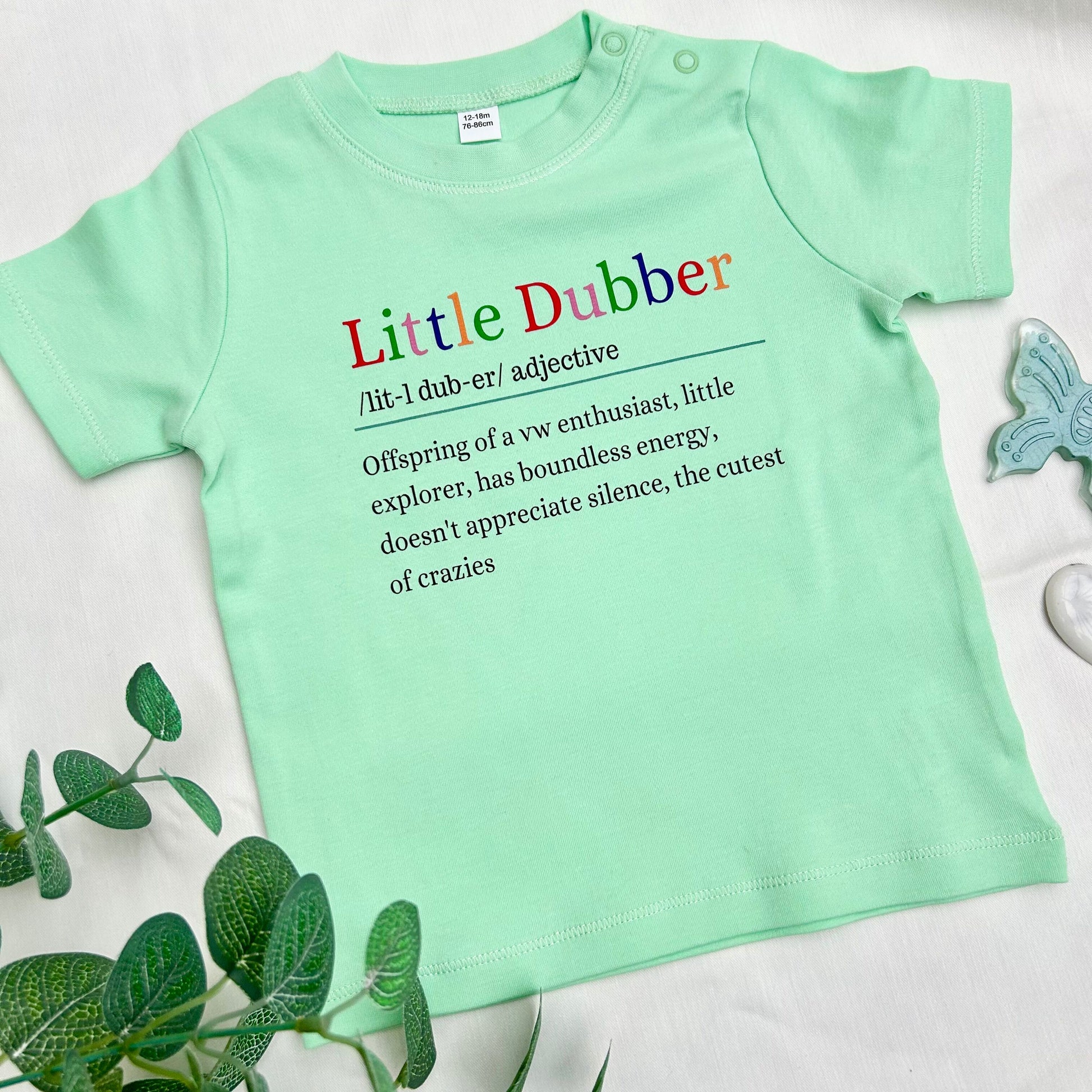 Mint colour t shirt with logo saying little dubber offspring of a vw enthusitast, little explorer, has boundless energy, doesn't appreciate silence, the cutest of crazies